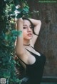 Beautiful Pichana Yoosuk shows off her figure in a black swimsuit (19 photos)